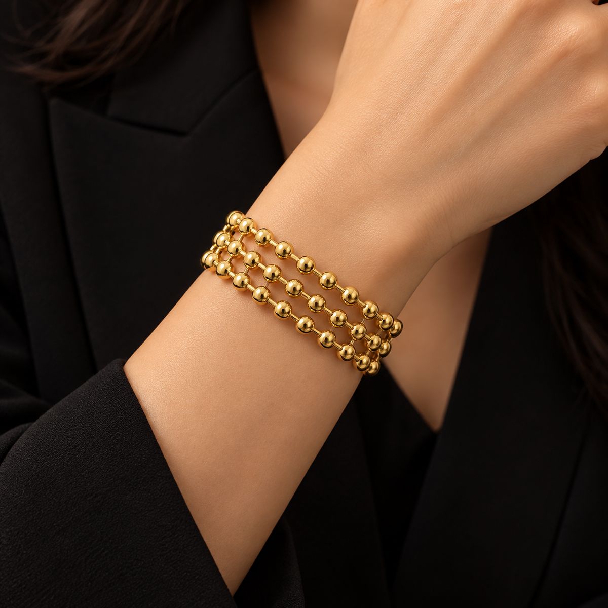 Pulseira Dourada Aberta com Três Filas de Esferas